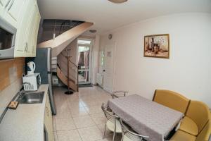 Kuchyň nebo kuchyňský kout v ubytování Guest house VadLen