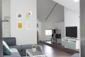 TV a/nebo společenská místnost v ubytování Casa Tua