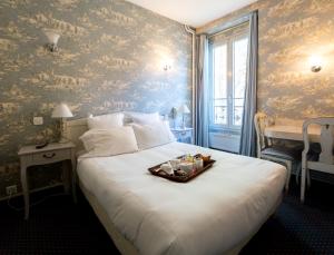 Krevet ili kreveti u jedinici u okviru objekta Regyn's Montmartre