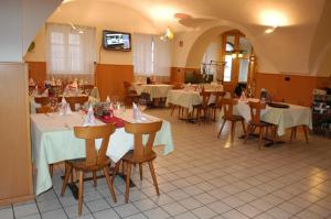 Reštaurácia alebo iné gastronomické zariadenie v ubytovaní Albergo Casagrande