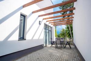 Balkón alebo terasa v ubytovaní Szent Bernadett Családi Apartmanház