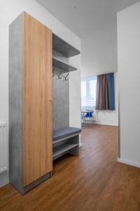 Posteľ alebo postele v izbe v ubytovaní Szent Bernadett Családi Apartmanház