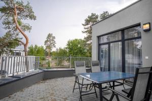 Balkón alebo terasa v ubytovaní Szent Bernadett Családi Apartmanház