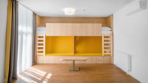 Posteľ alebo postele v izbe v ubytovaní Szent Bernadett Családi Apartmanház