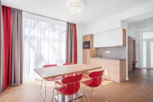 Kuchyň nebo kuchyňský kout v ubytování Szent Bernadett Családi Apartmanház
