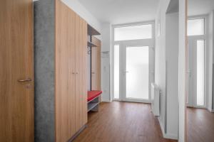 Posteľ alebo postele v izbe v ubytovaní Szent Bernadett Családi Apartmanház