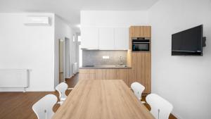 Kuchyňa alebo kuchynka v ubytovaní Szent Bernadett Családi Apartmanház