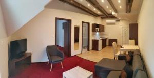 A seating area at Termál Apartmanház