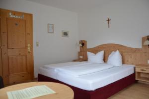 Postel nebo postele na pokoji v ubytování Haus Wally