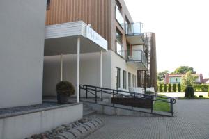 a building with a sign on the side of it at Aisa 39 in Pärnu