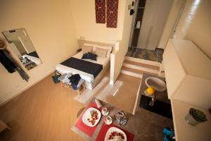 Postel nebo postele na pokoji v ubytování San Vito Accommodations