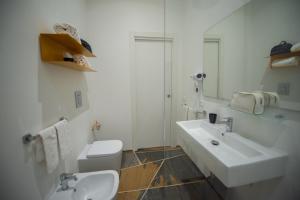 Koupelna v ubytování San Vito Accommodations