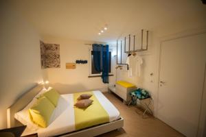 Postel nebo postele na pokoji v ubytování San Vito Accommodations