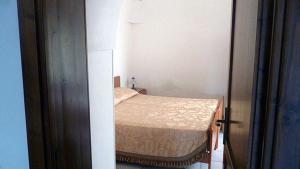 Łóżko lub łóżka w pokoju w obiekcie Agriturismo il Ciliegeto