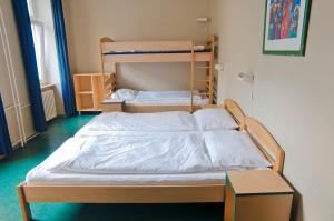 Postel nebo postele na pokoji v ubytování Happy Hotel Berlin