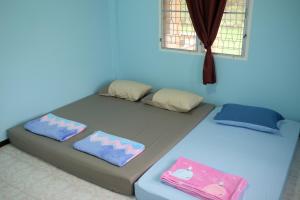 Postel nebo postele na pokoji v ubytování Little B house