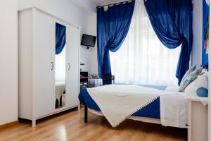 Кровать или кровати в номере Stella Marina