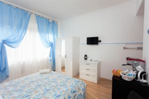 Кровать или кровати в номере Stella Marina