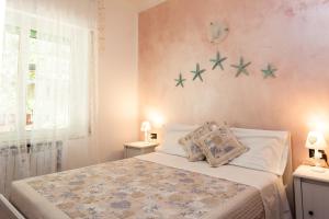 Кровать или кровати в номере Stella Marina