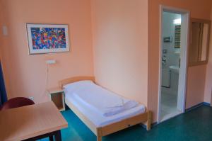Postel nebo postele na pokoji v ubytování Happy Hotel Berlin