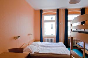 Postel nebo postele na pokoji v ubytování Happy Hotel Berlin