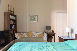 Posteľ alebo postele v izbe v ubytovaní Attico Luce B&B