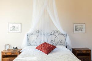 Posteľ alebo postele v izbe v ubytovaní Attico Luce B&B