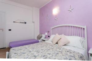 Кровать или кровати в номере Stella Marina