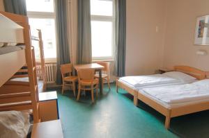 Postel nebo postele na pokoji v ubytování Happy Hotel Berlin