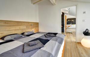 Posteľ alebo postele v izbe v ubytovaní Apartmány Tadeáš