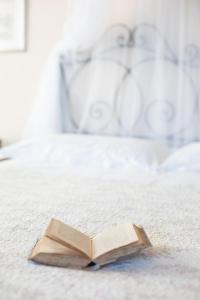 Posteľ alebo postele v izbe v ubytovaní Attico Luce B&B
