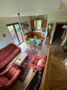 a living room with a couch and a table at Ignacówka in Kobyla Góra