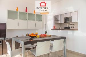 A kitchen or kitchenette at Palamós BeachFront Apartment