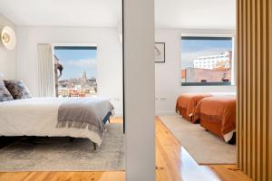 Krevet ili kreveti u jedinici u objektu Rooftop Balcony at Porto Historic Center