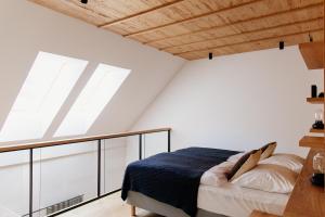 Postel nebo postele na pokoji v ubytování Apartmaji štAla
