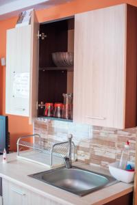 Kuchyň nebo kuchyňský kout v ubytování Danailovi Guest House