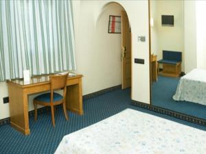 A bed or beds in a room at Hotel Ébora by Vivere Stays