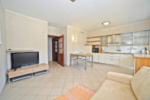 Kuchyňa alebo kuchynka v ubytovaní Grand Apartments