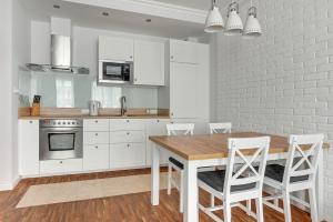 Kuchyňa alebo kuchynka v ubytovaní Grand Apartments