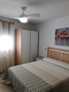 En eller flere senge i et værelse på casa CAZORLA C DEL VALLE