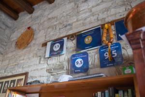 Certificat, premi, rètol o un altre document de Iosiphis Stonebuilt House