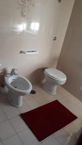 Phòng tắm tại Locanda Ermes