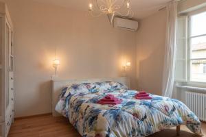 Postel nebo postele na pokoji v ubytování IN LUCUS Guest House