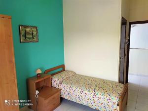 Postel nebo postele na pokoji v ubytování Hotel Eliseo