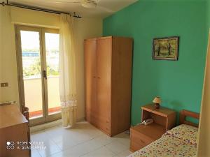 Postel nebo postele na pokoji v ubytování Hotel Eliseo