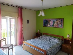 Postel nebo postele na pokoji v ubytování Hotel Eliseo