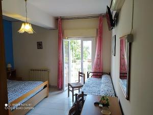 Postel nebo postele na pokoji v ubytování Hotel Eliseo