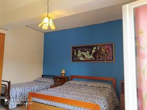 Postel nebo postele na pokoji v ubytování Hotel Eliseo