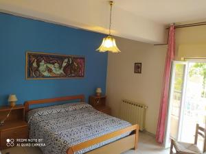 Postel nebo postele na pokoji v ubytování Hotel Eliseo
