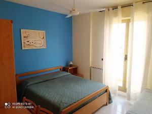 Postel nebo postele na pokoji v ubytování Hotel Eliseo